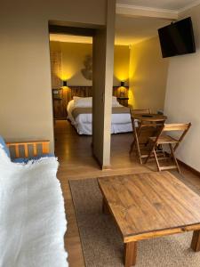 Postel nebo postele na pokoji v ubytování Blumen Hotel