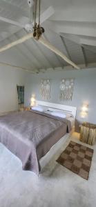 Postel nebo postele na pokoji v ubytování Casa Bambu - Charming villa in the heart of nature
