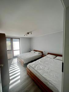 Postel nebo postele na pokoji v ubytování Bieszczadzkie Knieje P2