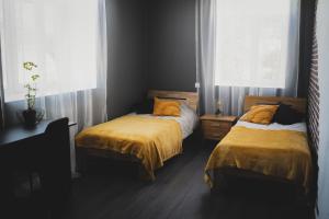 MaxiMar Apartment With Sauna客房内的一张或多张床位