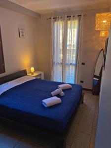 Posteľ alebo postele v izbe v ubytovaní Appartamento Bergamo Centro Piazza Pontida - The Italian Escape
