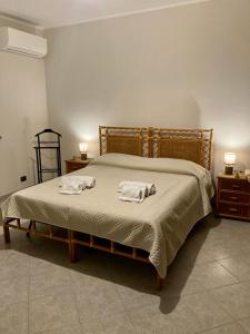 Ένα ή περισσότερα κρεβάτια σε δωμάτιο στο MÀERI HOME