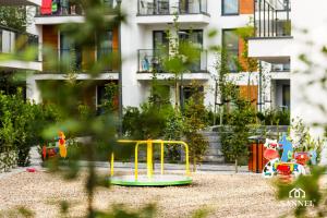 Zona de joacă pentru copii de la Apartament Green View - Pobierowo Baltic Apartments