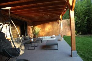 Coin salon dans l'établissement Dionbulles & Dionlodge Guesthouse, Private Wellness pool in option