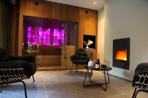 Coin salon dans l'établissement Dionbulles & Dionlodge Guesthouse, Private Wellness pool in option