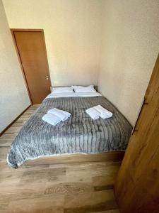 Posteľ alebo postele v izbe v ubytovaní Bakuriani - Happy Yard