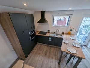 Kuchyň nebo kuchyňský kout v ubytování gîte chez Eric et Céline + 3 fotografie