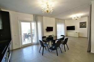 TV a/nebo společenská místnost v ubytování Palazzo Mosillo