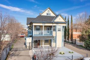 a large house with a balcony on a street at Cozy 1 bdr/1br near downtown in Sacramento