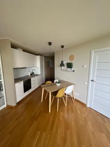 Kuchyň nebo kuchyňský kout v ubytování Elija Sea & leisure appartments Sventoji