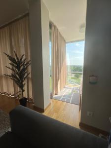 Posezení v ubytování Elija Sea & leisure appartments Sventoji