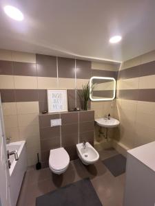 Koupelna v ubytování Elija Sea & leisure appartments Sventoji