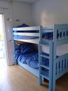 Poschodová posteľ alebo postele v izbe v ubytovaní Le petit escargot