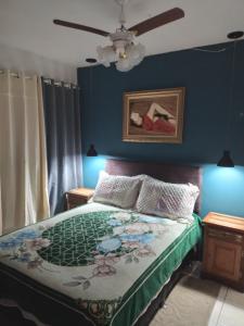 Postel nebo postele na pokoji v ubytování Apt com vista para o mar