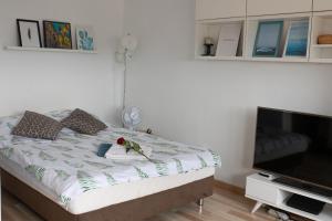 Posteľ alebo postele v izbe v ubytovaní Na chmury i góry - apartament