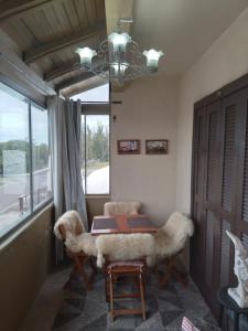 Posezení v ubytování Apt com vista para o mar