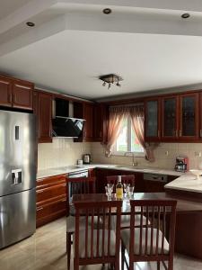 Kuchyň nebo kuchyňský kout v ubytování Hermes Casa Hersonissos + 4 fotografie