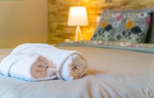 A bed or beds in a room at Faeax Guesthouse