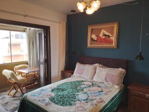 Postel nebo postele na pokoji v ubytování Apt com vista para o mar