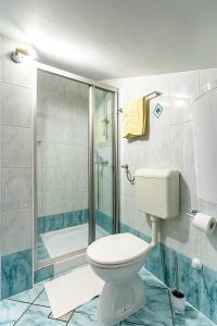 Kúpeľňa v ubytovaní Apartmani Utmar Cres