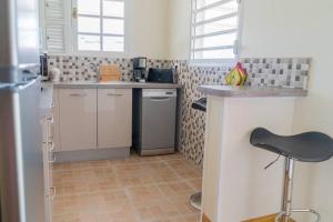 Kuchyň nebo kuchyňský kout v ubytování Location saisonnière bel appartement