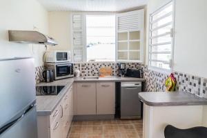 Kuchyň nebo kuchyňský kout v ubytování Location saisonnière bel appartement