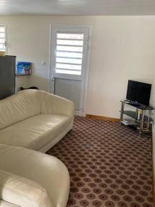 TV a/nebo společenská místnost v ubytování Location saisonnière bel appartement