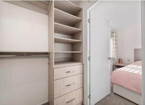 a bedroom with a bunk bed and a closet at Rivers Edge in Dollar