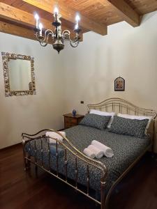 A bed or beds in a room at B&B Santa Maria