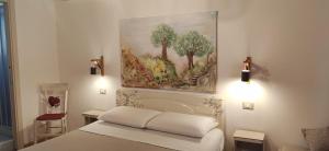 A bed or beds in a room at B&B Mastro Francesco