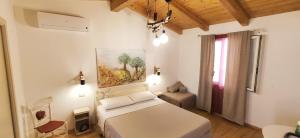 A bed or beds in a room at B&B Mastro Francesco