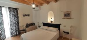 A bed or beds in a room at B&B Mastro Francesco