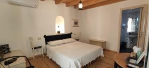 A bed or beds in a room at B&B Mastro Francesco