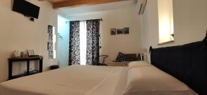 A bed or beds in a room at B&B Mastro Francesco