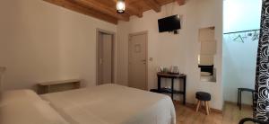 A bed or beds in a room at B&B Mastro Francesco