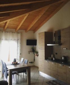 Televízia a/alebo spoločenská miestnosť v ubytovaní Residenze Mquadro