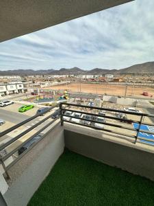 a balcony with a view of a parking lot at la florida aeropuerto in La Serena
