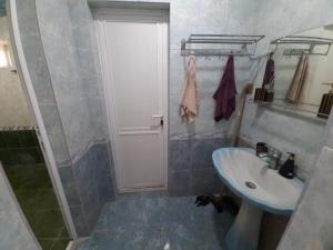 a bathroom with a sink and a shower at Nabran Suite in Aşağıoba