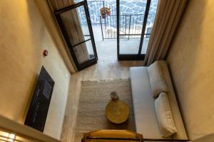 TV a/nebo společenská místnost v ubytování Hagafen Boutique Suites