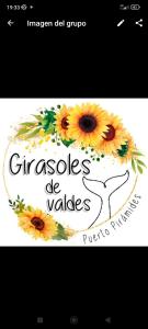 a picture of a sign with sunflowers on it at Girasoles de Valdes in Puerto Pirámides