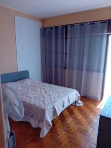 Postel nebo postele na pokoji v ubytování T3 2 Andar Ref 007