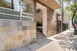 Το κτήριο όπου στεγάζεται  το δωμάτιο σε οικογενειακή κατοικία