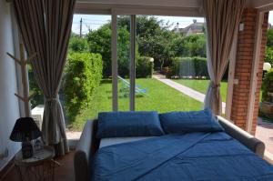 En eller flere senge i et værelse på La casetta nel verde