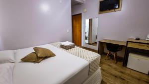 Postel nebo postele na pokoji v ubytování Golden View Hotel