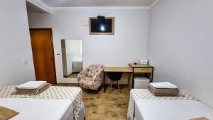 Postel nebo postele na pokoji v ubytování Golden View Hotel