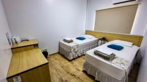 Postel nebo postele na pokoji v ubytování Golden View Hotel