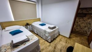 Postel nebo postele na pokoji v ubytování Golden View Hotel