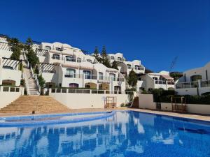 Πισίνα στο ή κοντά στο Appartement vue sur mer