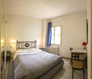 Voodi või voodid majutusasutuse Villa Fedora toas
