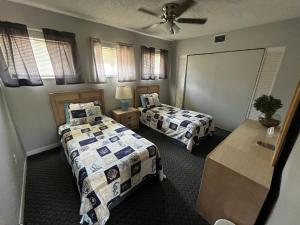 Voodi või voodid majutusasutuse Surfside Suites toas